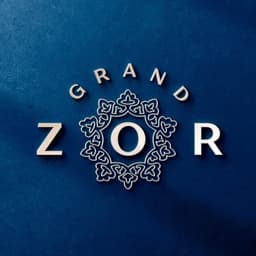 Grand Zor - Fairmont The Palm logo