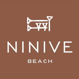Ninive Beach - J1 Beach logo